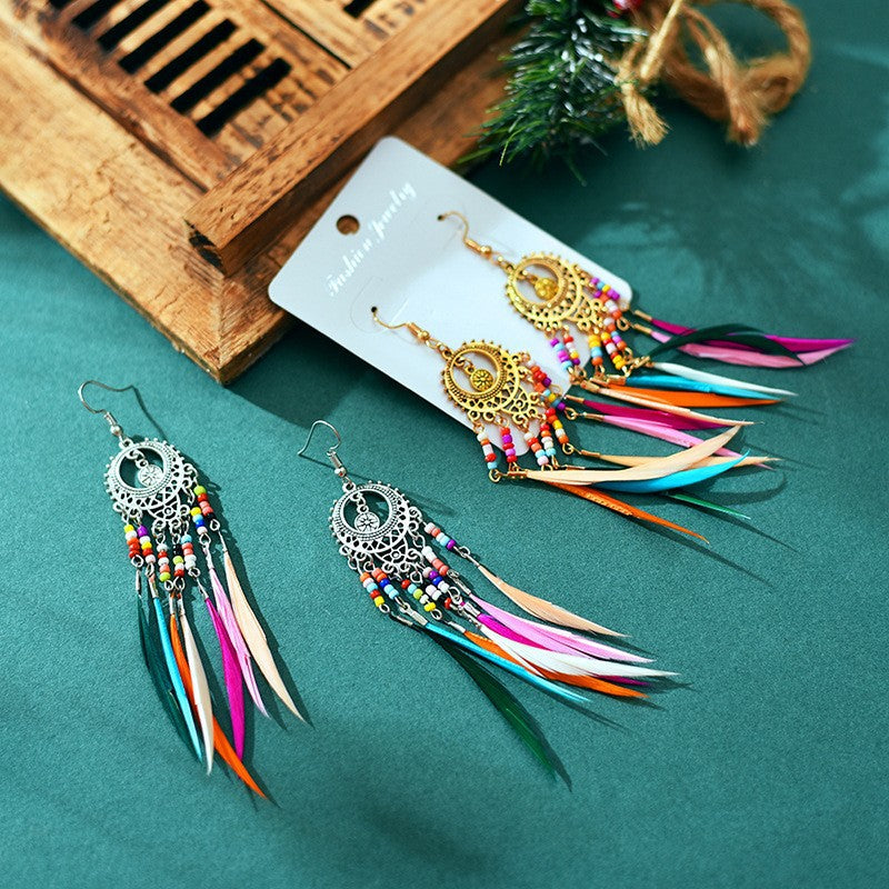 Wholesale Alloy Hollow Long Feather Earrings